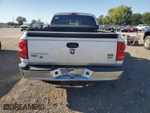 2008 Dodge Dakota Laramie with VIN 1D7HW58N18S634745, listed as a Copart auction lot 84002575 with 69,717 mi miles and Salvage title. Bid and sale history available at DreamBid. Image 6.