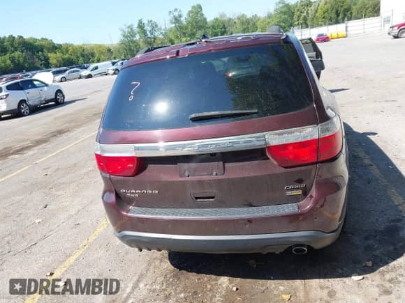 2012 Dodge Durango Crew with VIN 1C4RDJDG1CC153000, listed as a IAAI auction lot 43136614 with 186,788 mi miles and . Bid and sale history available at DreamBid. Image 16.