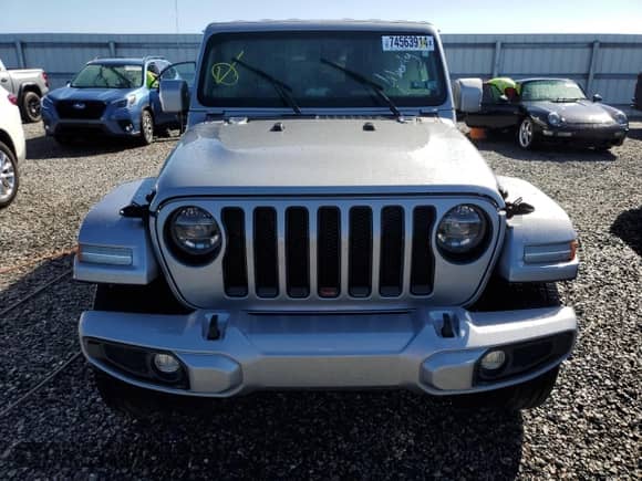 2021 Jeep Wrangler Unlimited Sahara High Altitude with VIN 1C4HJXEG5MW659306, listed as a Copart auction lot 74563914 with Not provided miles and Salvage title. Bid and sale history available at DreamBid. Image 5.