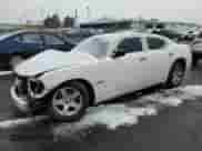 2009 Dodge Charger SXT with VIN 2B3KA33V39H626960, listed as a Copart auction lot 44058134 with 203,008 mi miles and Salvage title. Bid and sale history available at DreamBid. Image 1.