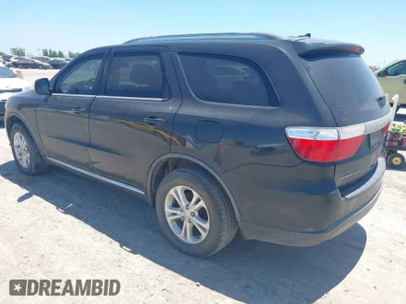 2013 Dodge Durango SXT with VIN 1C4RDHAG6DC500028, listed as a IAAI auction lot 42796818 with 232,689 mi miles and . Bid and sale history available at DreamBid. Image 3.