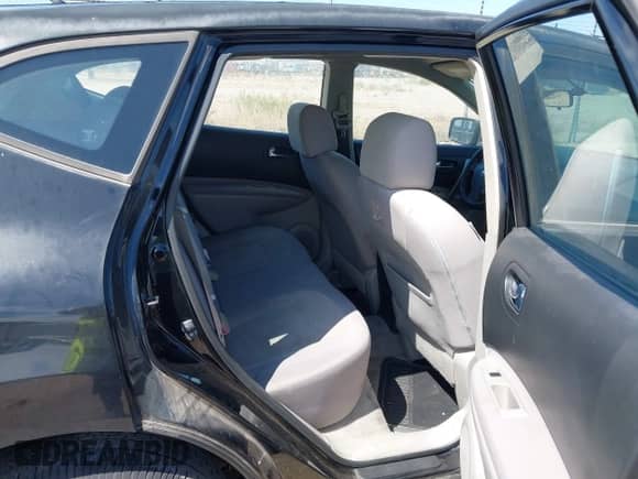 2009 Nissan Rogue SL z VIN JN8AS58T79W324796, wystawiony jako IAAI lot #43273452 z przebiegiem 200 156 mil mil oraz . Historia ofert i sprzedaży dostępna na DreamBid. Obrazek 8.