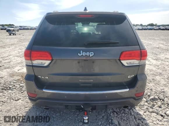 2017 Jeep Grand Cherokee Overland with VIN 1C4RJFCG9HC800659, listed as a Copart auction lot 67804285 with 105,483 mi miles and Salvage title. Bid and sale history available at DreamBid. Image 6.
