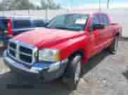 2005 Dodge Dakota SLT with VIN 1D7HW48N55S104123, listed as a IAAI auction lot 42828730 with 141,913 mi miles and . Bid and sale history available at DreamBid. Image 2.