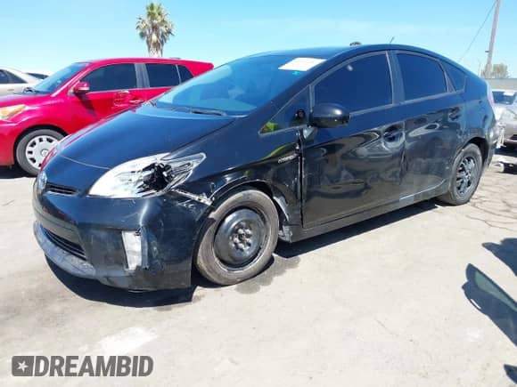 2015 Toyota Prius Four z VIN JTDKN3DU8F0411387, wystawiony jako IAAI lot #43043082 z przebiegiem 66 895 mil mil oraz . Historia ofert i sprzedaży dostępna na DreamBid. Obrazek 2.