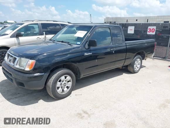 2000 Nissan Frontier XE with VIN 1N6DD26S7YC359637, listed as a IAAI auction lot 42752725 with 340,199 mi miles and . Bid and sale history available at DreamBid. Image 2.
