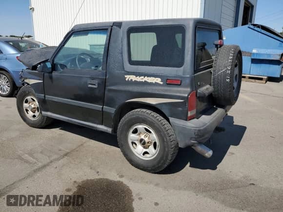 1996 Chevrolet Tracker с VIN 2CNBJ1869T6912380, выставлен на аукционе Copart как лот 68080054 с пробегом 175 206 миль миль и Списание • Salvage title. История ставок и продаж доступна на DreamBid. Изображение 2.