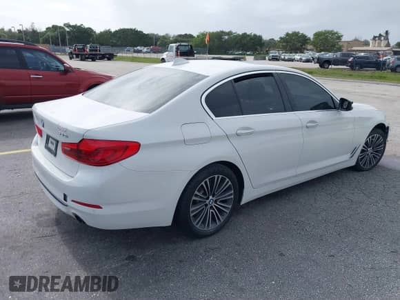 2018 BMW 5 Series 530i xDrive with VIN WBAJA7C52JG909607, listed as a IAAI auction lot 38487020 with Not provided miles and . Bid and sale history available at DreamBid. Image 4.