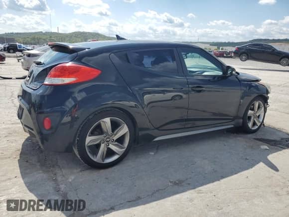 2013 Hyundai Veloster Turbo с VIN KMHTC6AE5DU144381, выставлен на аукционе Copart как лот 81855345 с пробегом 172 238 миль миль и Списание • Salvage title. История ставок и продаж доступна на DreamBid. Изображение 3.