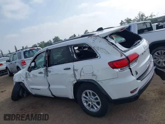 2020 Jeep Grand Cherokee Laredo E with VIN 1C4RJEAG4LC245884, listed as a IAAI auction lot 42564754 with 63,356 mi miles and . Bid and sale history available at DreamBid. Image 15.