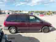 2000 Dodge Caravan with VIN 2B4GP2534YR737578, listed as a IAAI auction lot 43375169 with 167,152 mi miles and . Bid and sale history available at DreamBid. Image 13.