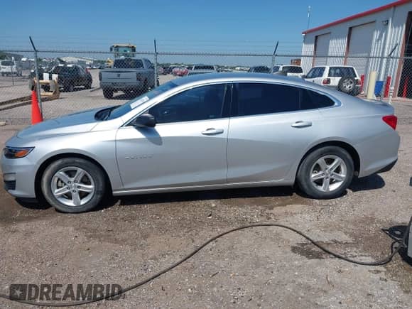 2020 Chevrolet Malibu LS z VIN 1G1ZB5STXLF147412, wystawiony jako IAAI lot #42683250 z przebiegiem 82 505 mil mil oraz . Historia ofert i sprzedaży dostępna na DreamBid. Obrazek 14.