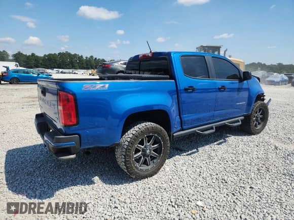 2022 Chevrolet Colorado 4WD Z71 with VIN 1GCGTDEN9N1162227, listed as a Copart auction lot 70826215 with 24,142 mi miles and Salvage title. Bid and sale history available at DreamBid. Image 3.
