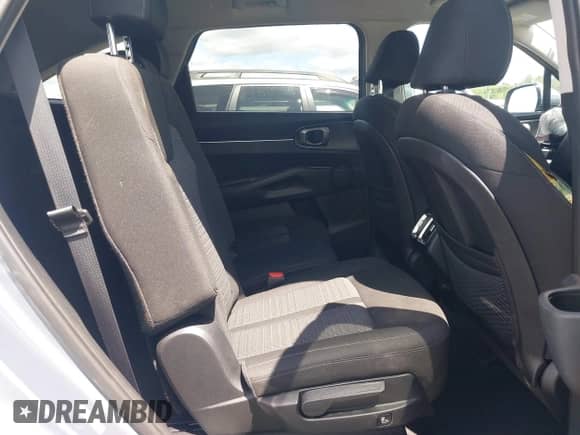 2023 Kia Sorento LX with VIN 5XYRG4LC4PG185612, listed as a IAAI auction lot 43118644 with 52,365 mi miles and . Bid and sale history available at DreamBid. Image 8.