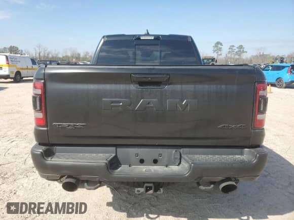 2023 Ram 1500 TRX z VIN 1C6SRFU96PN515714, wystawiony jako Copart lot #88884065 z przebiegiem 15 395 mil mil oraz Szkoda całkowita • Salvage title. Historia ofert i sprzedaży dostępna na DreamBid. Obrazek 6.