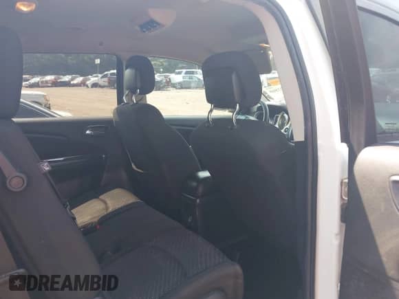 2014 Dodge Journey American Value with VIN 3C4PDCAB9ET198575, listed as a IAAI auction lot 42872868 with 214,944 mi miles and . Bid and sale history available at DreamBid. Image 8.