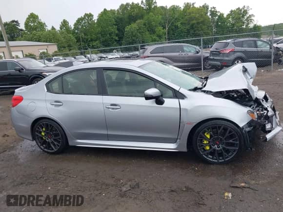 2019 Subaru WRX STI Limited z VIN JF1VA2V63K9807256, wystawiony jako IAAI lot #42390008 z przebiegiem 74 821 mil mil oraz . Historia ofert i sprzedaży dostępna na DreamBid. Obrazek 13.