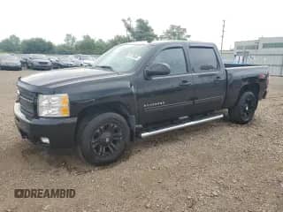 2010 Chevrolet Silverado 1500 LTZ with VIN 3GCRKTE32AG288459, listed as a Copart auction lot 70170465 with 218,261 mi miles and Salvage title. Bid and sale history available at DreamBid. Image 1.