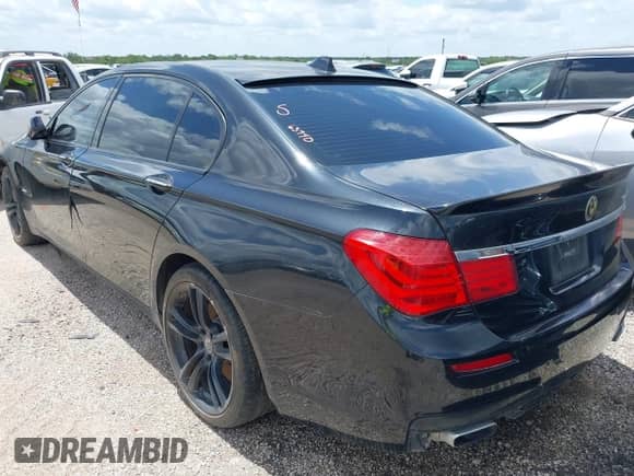 2012 BMW 7 Series 750Li z VIN WBAKB8C55CC963940, wystawiony jako IAAI lot #42545862 z przebiegiem 166 310 mil mil oraz . Historia ofert i sprzedaży dostępna na DreamBid. Obrazek 15.