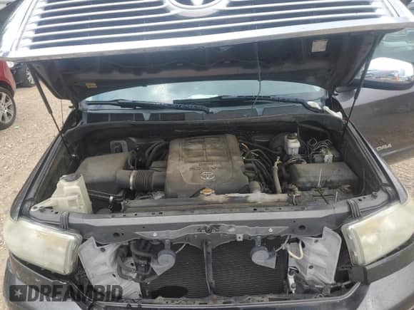 2012 Toyota Tundra Limited z VIN 5TFSY5F10CX132864, wystawiony jako Copart lot #70156505 z przebiegiem 186 395 mil mil oraz Szkoda całkowita • Salvage title. Historia ofert i sprzedaży dostępna na DreamBid. Obrazek 11.