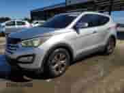 2013 Hyundai Santa Fe Sport z VIN 5XYZU3LBXDG062502, wystawiony jako Copart lot #89874145 z przebiegiem 190 130 mil mil oraz Szkoda całkowita • Salvage title. Historia ofert i sprzedaży dostępna na DreamBid. Obrazek 1.