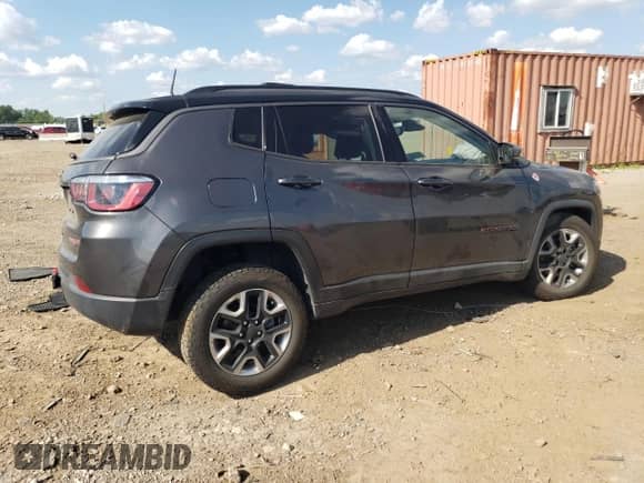 2017 Jeep Compass Trailhawk with VIN 3C4NJDDB5HT657784, listed as a Copart auction lot 63145835 with 82,022 mi miles and Salvage title. Bid and sale history available at DreamBid. Image 3.