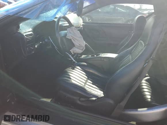 2000 Chevrolet Camaro Z28 z VIN 2G1FP22G9Y2104310, wystawiony jako Copart lot #77654484 z przebiegiem 69 924 mil mil oraz Szkoda całkowita • Salvage title. Historia ofert i sprzedaży dostępna na DreamBid. Obrazek 7.