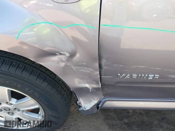 2008 Mercury Mariner with VIN 4M2CU91148KJ50412, listed as a IAAI auction lot 41715972 with 130,426 mi miles and . Bid and sale history available at DreamBid. Image 14.