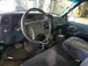 1996 Chevrolet Silverado 2500 с VIN 1GCGK24R1TZ130527, выставлен на аукционе Copart как лот 67178235 с пробегом 212 037 миль миль и Списание • Salvage title. История ставок и продаж доступна на DreamBid. Изображение 8.