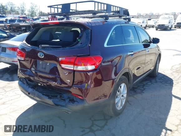 2018 Kia Sorento LX with VIN 5XYPG4A56JG383479, listed as a IAAI auction lot 43166709 with 103,212 mi miles and . Bid and sale history available at DreamBid. Image 4.