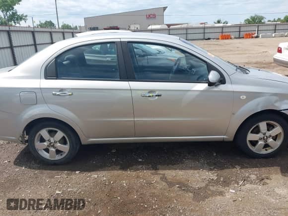 2008 Chevrolet Aveo LT z VIN KL1TG56678B069082, wystawiony jako IAAI lot #42314421 z przebiegiem 164 296 mil mil oraz . Historia ofert i sprzedaży dostępna na DreamBid. Obrazek 13.
