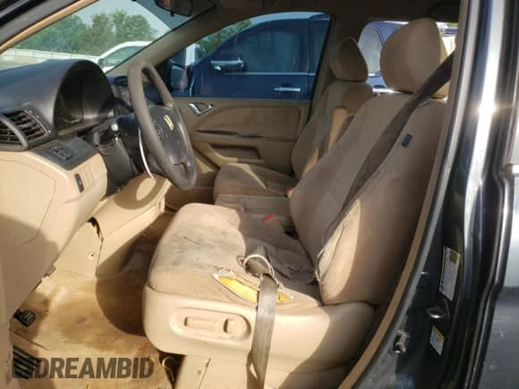 2005 Honda Odyssey EX z VIN 5FNRL38425B010111, wystawiony jako Copart lot #57145835 z przebiegiem 220 981 mil mil oraz Czysty tytuł • Clean title. Historia ofert i sprzedaży dostępna na DreamBid. Obrazek 7.