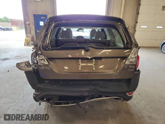 2012 Volvo XC70 T6 z VIN YV4902BZ5C1134366, wystawiony jako Copart lot #67560775 z przebiegiem 79 495 mil mil oraz Szkoda całkowita • Salvage title. Historia ofert i sprzedaży dostępna na DreamBid. Obrazek 6.