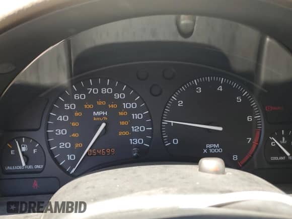 1999 Saturn SC with VIN 1G8ZY1277XZ299213, listed as a Copart auction lot 63788405 with 54,699 mi miles and Salvage title. Bid and sale history available at DreamBid. Image 9.