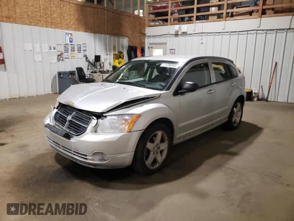 2007 Dodge Caliber R/T with VIN 1B3HE78K67D409143, listed as a Copart auction lot 71726345 with 135,238 mi miles and Salvage title. Bid and sale history available at DreamBid. Image 1.