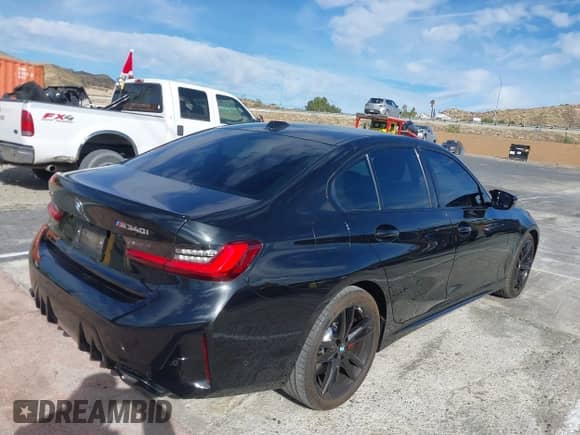2023 BMW 3 Series M340i xDrive with VIN 3MW49FF09P8D65839, listed as a IAAI auction lot 41335415 with 10,957 mi miles and . Bid and sale history available at DreamBid. Image 4.