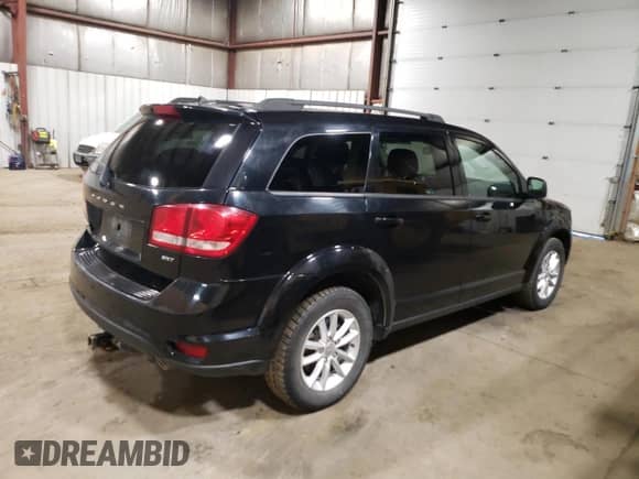 2016 Dodge Journey SXT with VIN 3C4PDDBG7GT129435, listed as a Copart auction lot 85379555 with 69,400 mi miles and Clean title. Bid and sale history available at DreamBid. Image 3.