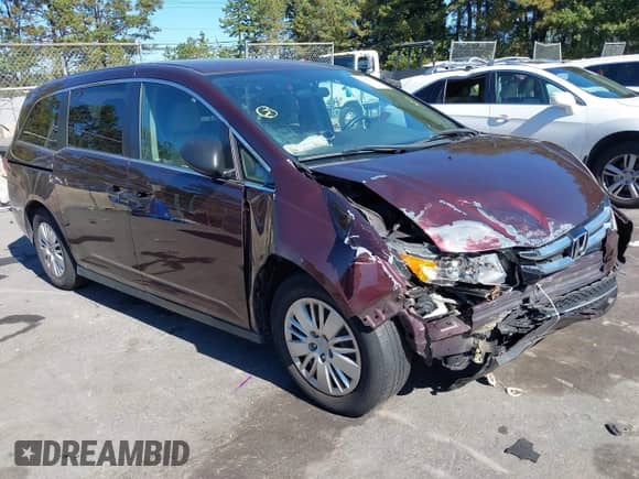 2014 Honda Odyssey LX with VIN 5FNRL5H2XEB059826, listed as a IAAI auction lot 43448763 with 154,540 mi miles and . Bid and sale history available at DreamBid. Image 1.