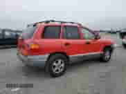2003 Hyundai Santa Fe GLS with VIN KM8SC13D83U532951, listed as a Copart auction lot 60164895 with 244,487 mi miles and Salvage title. Bid and sale history available at DreamBid. Image 3.