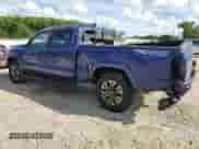 2022 Toyota Tacoma SR5 with VIN 3TYDZ5BN0NT005849, listed as a Copart auction lot 71113125 with 63,449 mi miles and Salvage title. Bid and sale history available at DreamBid. Image 2.