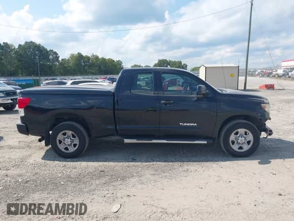 2012 Toyota Tundra z VIN 5TFRU5F11CX027728, wystawiony jako IAAI lot #43122765 z przebiegiem 196 119 mil mil oraz . Historia ofert i sprzedaży dostępna na DreamBid. Obrazek 14.