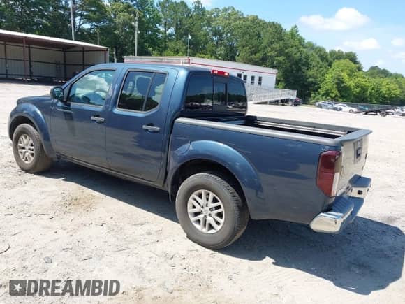 2015 Nissan Frontier SV z VIN 1N6AD0ER2FN737497, wystawiony jako IAAI lot #42561512 z przebiegiem 127 234 mil mil oraz . Historia ofert i sprzedaży dostępna na DreamBid. Obrazek 3.