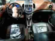 2013 Chevrolet Sonic LTZ with VIN 1G1JE5SH6D4102528, listed as a Copart auction lot 47419475 with 129,812 mi miles and Salvage title. Bid and sale history available at DreamBid. Image 8.