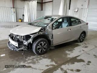 2018 Toyota Prius Plus z VIN JTDKARFP7J3084848, wystawiony jako Copart lot #84256715 z przebiegiem 96 007 mil mil oraz Szkoda całkowita • Salvage title. Historia ofert i sprzedaży dostępna na DreamBid. Obrazek 1.