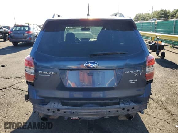 2014 Subaru Forester XT Premium with VIN JF2SJGDC8EH464442, listed as a Copart auction lot 68788635 with 114,539 mi miles and Salvage title. Bid and sale history available at DreamBid. Image 6.