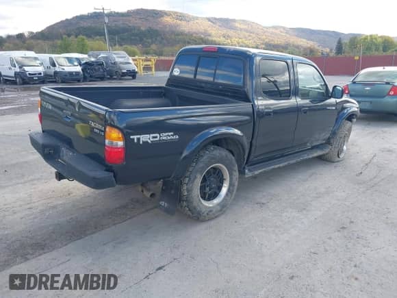 2003 Toyota Tacoma z VIN 5TEHN72N53Z249453, wystawiony jako IAAI lot #43472155 z przebiegiem 162 053 mil mil oraz . Historia ofert i sprzedaży dostępna na DreamBid. Obrazek 4.