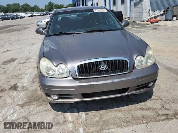 2004 Hyundai Sonata z VIN KMHWF25S24A985640, wystawiony jako Copart lot #63283325 z przebiegiem 235 372 mil mil oraz Szkoda całkowita • Salvage title. Historia ofert i sprzedaży dostępna na DreamBid. Obrazek 13.