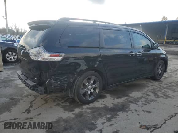 2015 Toyota Sienna SE with VIN 5TDXK3DC4FS557000, listed as a Copart auction lot 82646895 with 192,296 mi miles and Clean title. Bid and sale history available at DreamBid. Image 3.