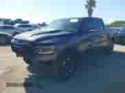 2022 Ram 1500 Rebel z VIN 1C6SRFLT4NN177112, wystawiony jako IAAI lot #42402050 z przebiegiem 26 239 mil mil oraz . Historia ofert i sprzedaży dostępna na DreamBid. Obrazek 2.