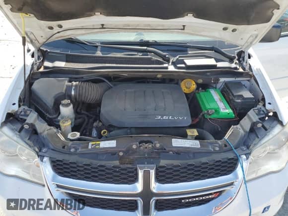 2016 Dodge Grand Caravan SE z VIN 2C4RDGBG1GR400969, wystawiony jako Copart lot #65642405 z przebiegiem 252 022 mil mil oraz Czysty tytuł • Clean title. Historia ofert i sprzedaży dostępna na DreamBid. Obrazek 12.